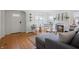 Bright living room with hardwood floors, a decorative fireplace, and comfortable seating, creating an inviting atmosphere at 1025 E 60Th St, Indianapolis, IN 46220