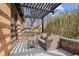 Cozy covered patio with a comfortable seating area, perfect for relaxation and outdoor enjoyment at 1025 E 60Th St, Indianapolis, IN 46220