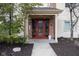 Inviting doorway of home number 1044 showing attractive design and landscaping at 1044 Timber Creek Dr # 4, Carmel, IN 46032