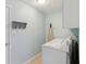Laundry room with a washer, dryer, and built-in storage solutions at 10934 Haig Point Dr, Fishers, IN 46037