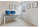 Bright office space with a minimalist desk setup and lots of natural light at 10934 Haig Point Dr, Fishers, IN 46037
