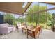 Cozy sunroom with natural light, comfortable seating, and picturesque outdoor views at 10934 Haig Point Dr, Fishers, IN 46037