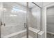 Walk-in shower with glass door and a built-in bench at 11003 Liberation Trce, Noblesville, IN 46060