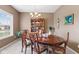 Cozy dining room with classic wood furniture and a chandelier, perfect for Gathering gatherings at 11182 Black Gold Dr, Noblesville, IN 46060