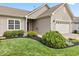 Charming home features a well-maintained lawn and tidy landscaping, enhancing its curb appeal at 11182 Black Gold Dr, Noblesville, IN 46060