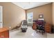 Comfortable home office space with a plush leather chair and traditional wooden desk setup at 11182 Black Gold Dr, Noblesville, IN 46060