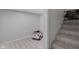Spacious basement area with tile flooring and a toy car at 1139 E 35Th St, Indianapolis, IN 46205