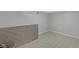 Basement storage area with tile flooring, a window, and storage supplies at 1139 E 35Th St, Indianapolis, IN 46205