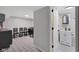 Laundry room with a half bath featuring modern fixtures and a window at 1139 E 35Th St, Indianapolis, IN 46205