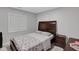 Cozy bedroom with neutral tones, a comfortable queen-size bed, and natural light from the window at 1139 E 35Th St, Indianapolis, IN 46205