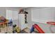 Bright bedroom with lots of toys and natural light from the windows at 1139 E 35Th St, Indianapolis, IN 46205