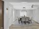 Dining area features modern light fixture and neutral decor, perfect for entertaining at 1139 E 35Th St, Indianapolis, IN 46205