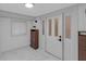 Inviting entryway featuring a contemporary door, stylish decor, and elegant flooring at 1139 E 35Th St, Indianapolis, IN 46205