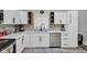 Updated kitchen with stainless steel dishwasher and updated backsplash at 1139 E 35Th St, Indianapolis, IN 46205