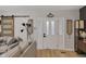 Cozy living room with modern furnishings, wooden floors and a view of the front door at 1139 E 35Th St, Indianapolis, IN 46205