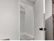 Neat storage space featuring carpet and clean, painted walls for a tidy look at 1139 E 35Th St, Indianapolis, IN 46205