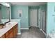 Bathroom with double sinks, shower and tub/shower combo at 11958 Logan Hunter Trl, Noblesville, IN 46060