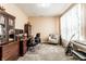Inviting home office with a large desk, comfortable seating, and ample storage for productivity at 11958 Logan Hunter Trl, Noblesville, IN 46060