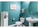 Chic powder room with modern fixtures, sleek design, and stylish decor, perfect for guests at 11958 Logan Hunter Trl, Noblesville, IN 46060