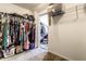 Spacious walk-in closet with ample hanging space, shelving, and access to another closet at 11958 Logan Hunter Trl, Noblesville, IN 46060
