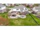 Aerial view of backyard featuring an outdoor kitchen, fire pit and patio at 12030 Auburn Creek, Zionsville, IN 46077