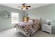 A bright bedroom featuring natural lighting and modern furnishings at 12030 Auburn Creek, Zionsville, IN 46077