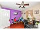 This bedroom features hardwood floors, ceiling fan, and is brightly lit at 1270 Eugene St, Indianapolis, IN 46208
