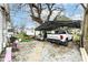 View of covered carport sheltering vehicles, offering protection from the elements at 1270 Eugene St, Indianapolis, IN 46208