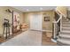 Finished basement area with carpeting, staircase, and a wine-tasting theme at 13214 Mink Ln, Carmel, IN 46074