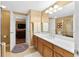 Bathroom with a bright white marble vanity and sink, with tile floors at 13214 Mink Ln, Carmel, IN 46074