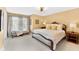 Spacious bedroom with a large window, soft carpet and elegant decor at 13214 Mink Ln, Carmel, IN 46074