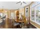 Charming breakfast nook with a ceiling fan, hardwood floors, and large bay window at 13214 Mink Ln, Carmel, IN 46074