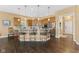 Inviting kitchen area with bar seating, pendant lighting, and stainless steel appliances at 13214 Mink Ln, Carmel, IN 46074