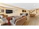Open living room features a large sofa, pool table, and multiple televisions at 13214 Mink Ln, Carmel, IN 46074