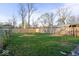 A spacious backyard featuring a newly constructed wooden fence, and healthy green grass at 1331 W 33Rd St, Indianapolis, IN 46208