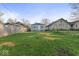 View of a spacious backyard featuring newly constructed wooden fence, bright sky at 1331 W 33Rd St, Indianapolis, IN 46208
