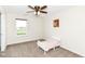 Charming bedroom features a large window that overlooks green pastures at 1455 Bigleaf Dr, Sheridan, IN 46069