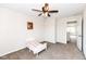 This bedroom features a ceiling fan and an open doorway at 1455 Bigleaf Dr, Sheridan, IN 46069