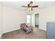 Neutral ' bedroom with ceiling fan, window, and built-in closet at 1455 Bigleaf Dr, Sheridan, IN 46069