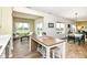 Living room showcases seamless flow to dining area with island seating, perfect for entertaining and Gathering gatherings at 1455 Bigleaf Dr, Sheridan, IN 46069