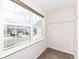 Walk-in closet with shelving and a window offering a view of the neighborhood at 1455 Bigleaf Dr, Sheridan, IN 46069