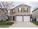 Charming two-story home featuring a two-car garage and classic design elements at 15398 Border Dr, Noblesville, IN 46060