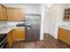 Well-equipped kitchen featuring stainless steel refrigerator and wooden cabinets at 15398 Border Dr, Noblesville, IN 46060