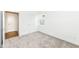 Clean bedroom featuring neutral carpet, white walls, a window, and a closet door at 159 Derringer Ave, Westfield, IN 46074