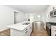 Modern kitchen featuring a kitchen island with a sink and stainless steel appliances at 159 Derringer Ave, Westfield, IN 46074