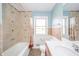 Bathroom featuring tile and bathtub at 1611 Orchard Ln, Anderson, IN 46011