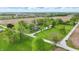 Beautiful aerial view of a charming two-story home with a large yard, mature trees and a separate garage at 1901 S Old State Road 67, Paragon, IN 46166