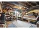 Unfinished basement with storage and cement floor at 1901 S Old State Road 67, Paragon, IN 46166