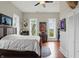 Spacious bedroom features hardwood floors, natural light, and decor at 1901 S Old State Road 67, Paragon, IN 46166