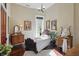 Charming bedroom with hardwood floors, decorative art, and a cozy rug, creating a vintage and inviting space at 1901 S Old State Road 67, Paragon, IN 46166